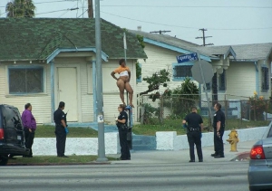 cops surround naked black woman