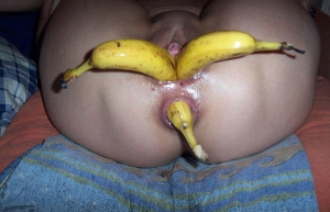 three bananas in her pussy and asshole