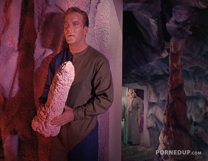 captain kirk holds a penis shaped rock
