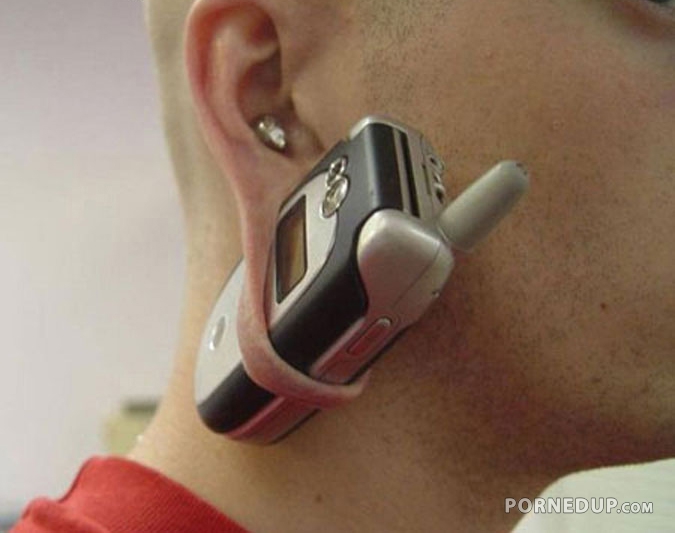 cell phone in guys ear lobe