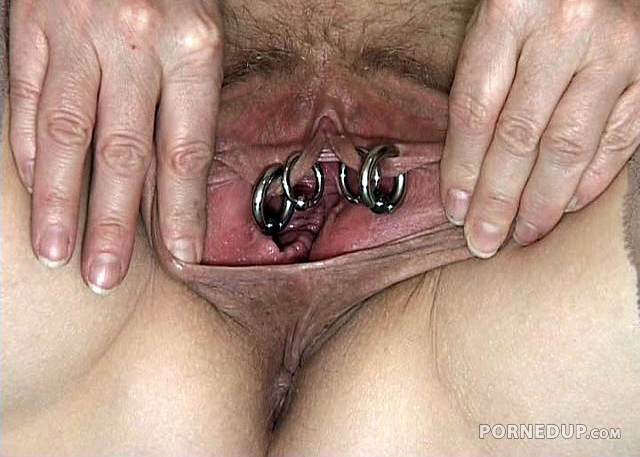 disgusting stretched pierced pussy
