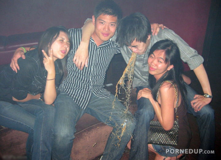 drunk guy pukes during group photo