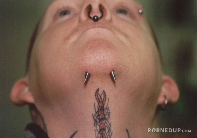 guy with spikes under his chin