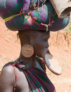 african woman with stretched lip
