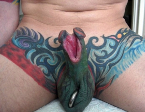 crazy guy split his tattoo cock in half