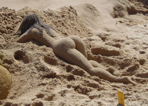 girl with amazing ass covered in sand