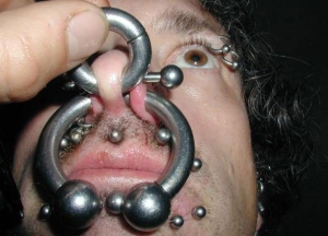 huge piercing in this guys nose huge piercing in this guys nose