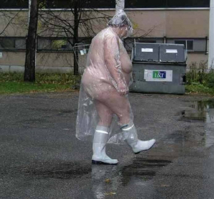Naked Woman In Transparant Poncho