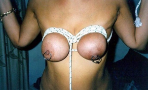 tied up pierced tits