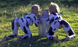two girls naked in cow makeup