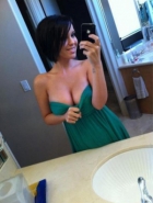 Hot girl in green dress shows off