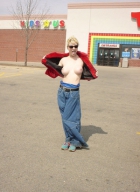 Raver slut flashing tits in public